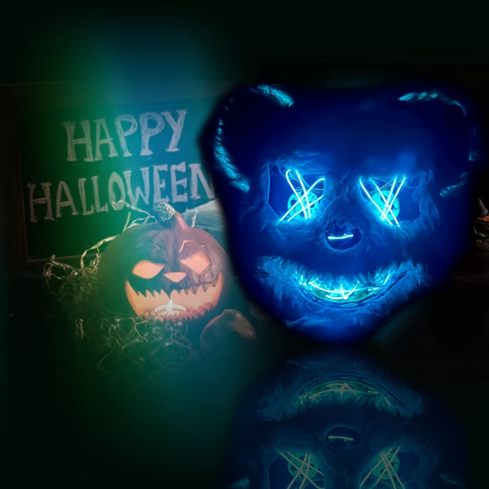 Blue glowing mask next to a 'Happy Halloween' pumpkin with glowing text