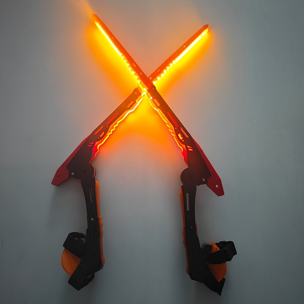 Crossed ski boots with glowing orange lights on a white background