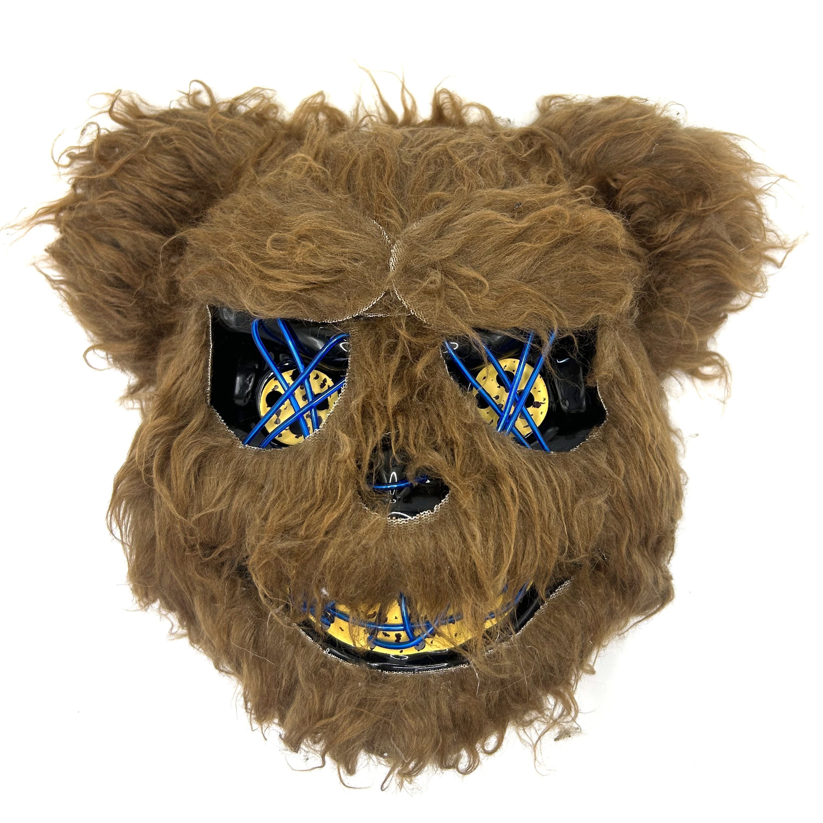 Fuzzy brown mask with blue and yellow accents on a white background
