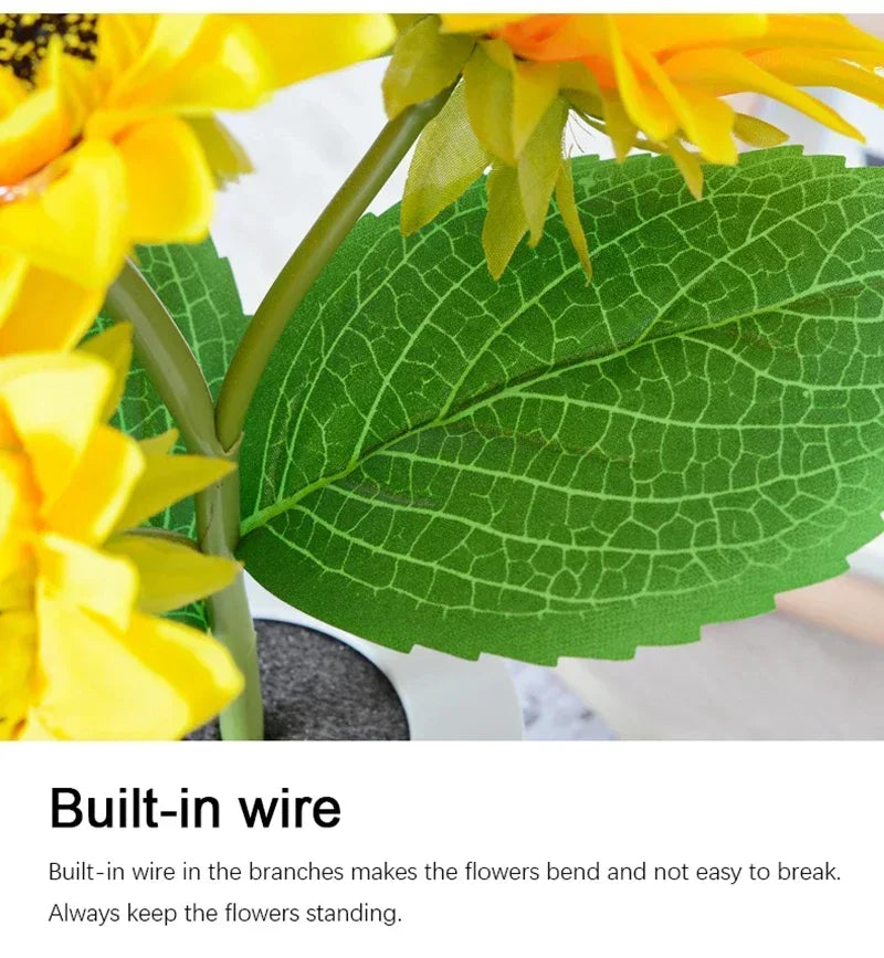 Close-up of yellow sunflower with green leaf and text about built-in wire.