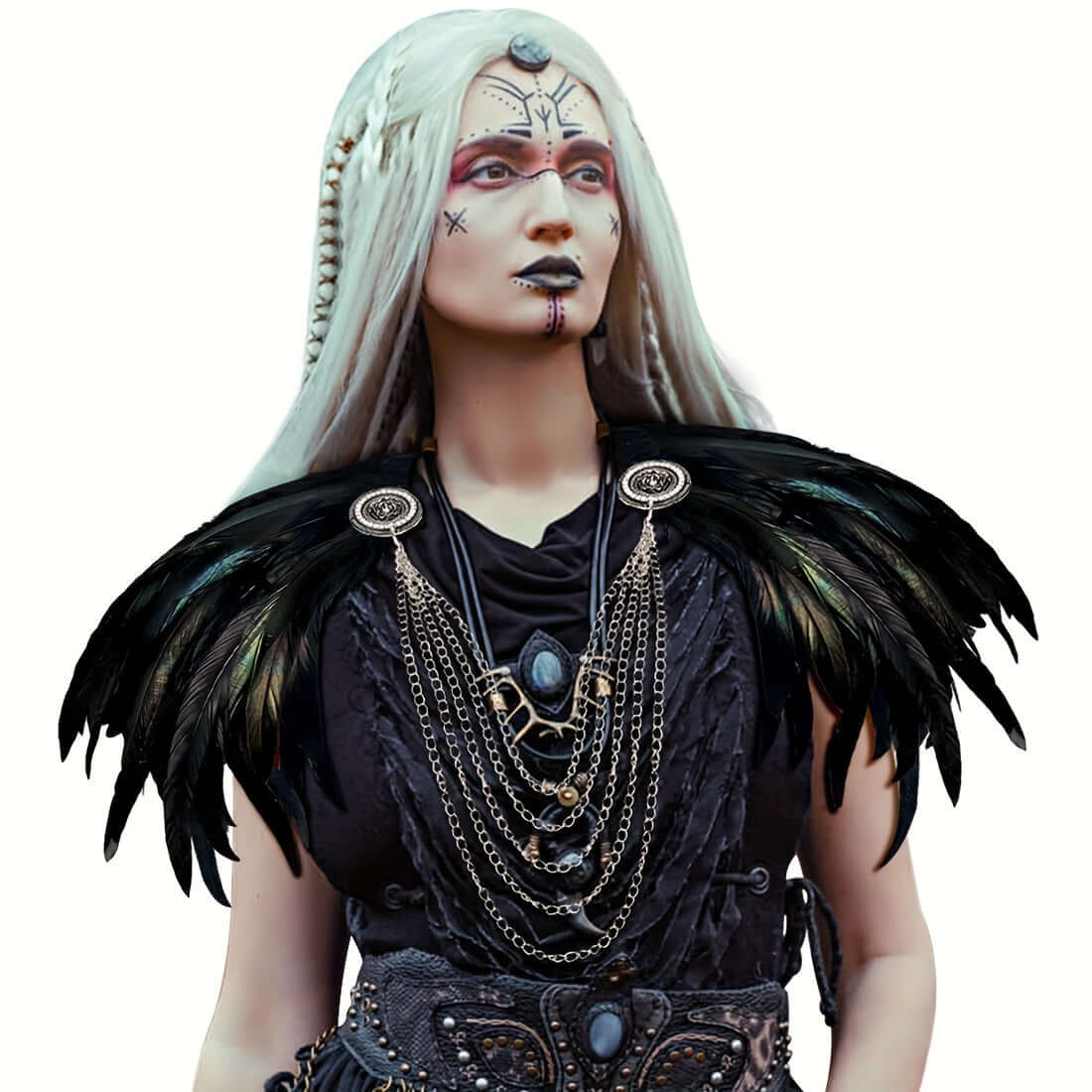 Person wearing a dark, ornate costume with feathered shoulders on a white background