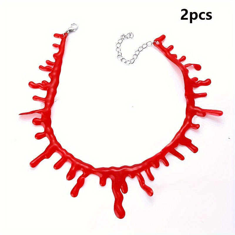 Red necklace with a chain on a white background